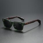 Women’s square sunglasses with transparent green frame and black UV400 lenses