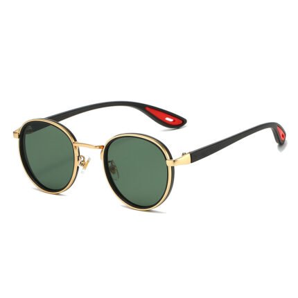 Round sunglasses with black and gold frame, green lenses, and black temples with red inner tips