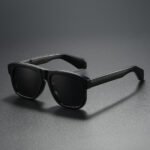 Black square unisex polarized sunglasses with solid black lenses and thick modern frame